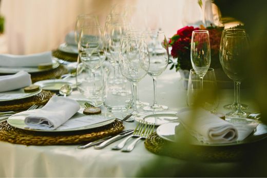 Elegant table setting with wine glasses for a private Casa Cinque dining experience
